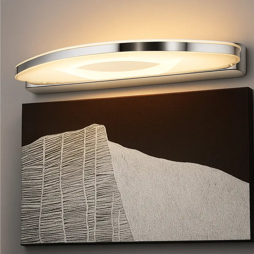 Applique murale LED design, chrome et acrylique, lumière douce directionnelle.