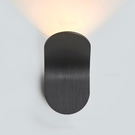 Luminaire mural LED noir ovale, lumière douce montante, design moderne et minimaliste.